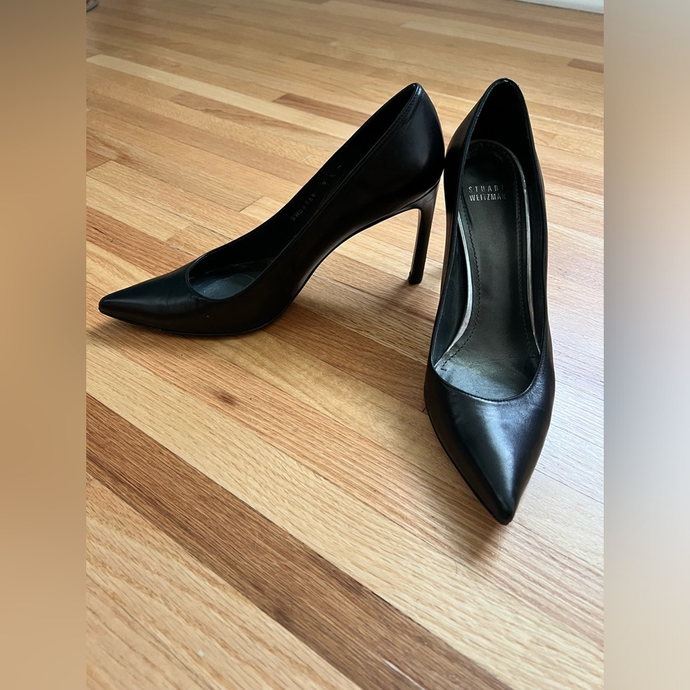 Black leather Stuart Weitzman pumps